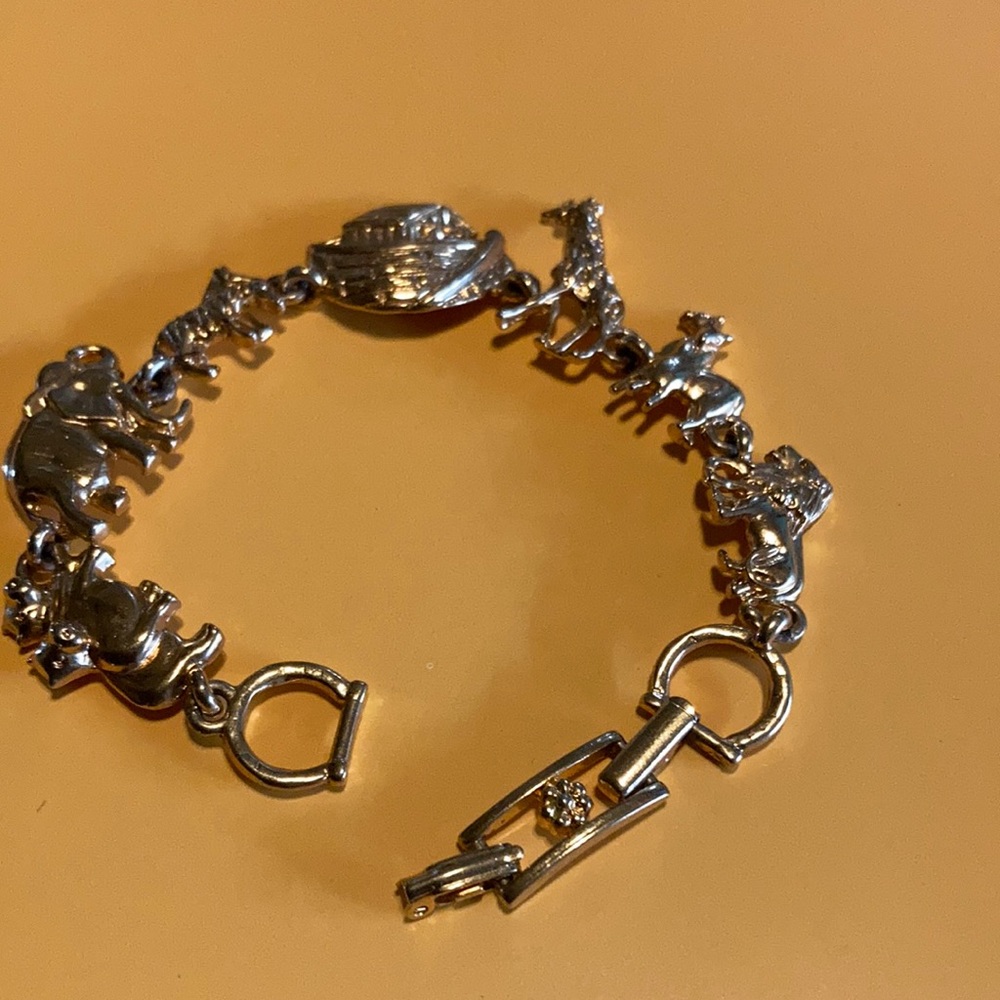 Gold tone Noah Ark Bracelet.
